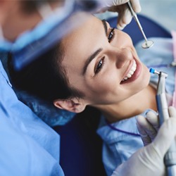 Woman having her teeth polished