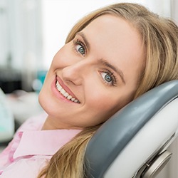 Smiling woman in dental chair