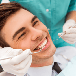 Man receiving dental exam