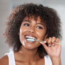 Woman brushing her teeth