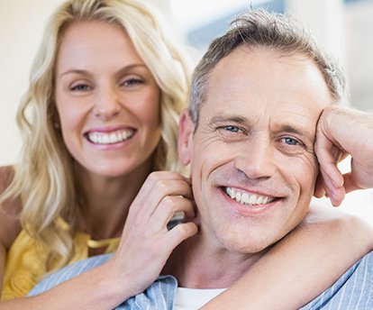 Older couple with happy healthy smiles