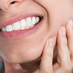 Closeup of patient holding jaw