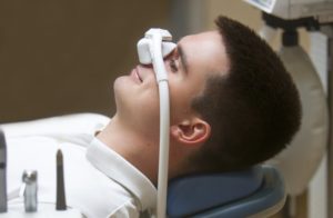 man wearing a nitrous oxide mask before a dental procedure 
